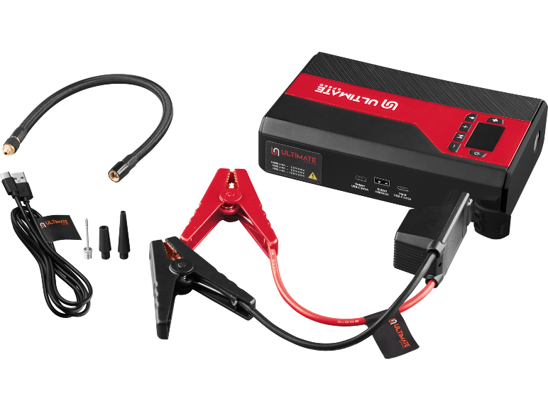 Portable jump starter with cables, clamps, and various charging accessories.