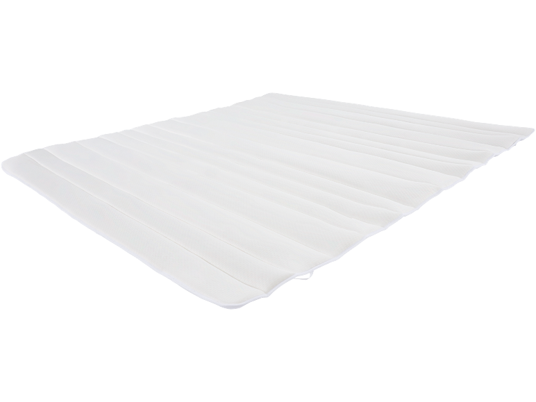 White mattress topper with quilted seams