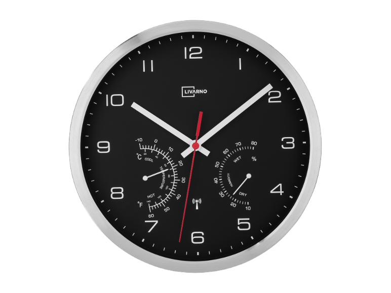 Black wall clock with thermometer and hygrometer, featuring a silver frame.