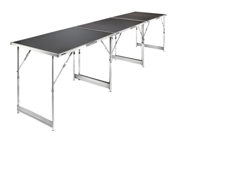Three interconnected folding tables with black tops and silver frames, extending to the right.