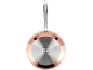 Copper frying pan with a metallic handle and an induction base with cooking symbols.