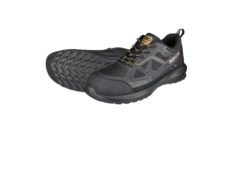 Black work shoes with yellow laces and a non-slip sole.