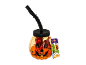 Halloween pumpkin-shaped jar with a straw, filled with candies, and a Halloween-themed candy pack.