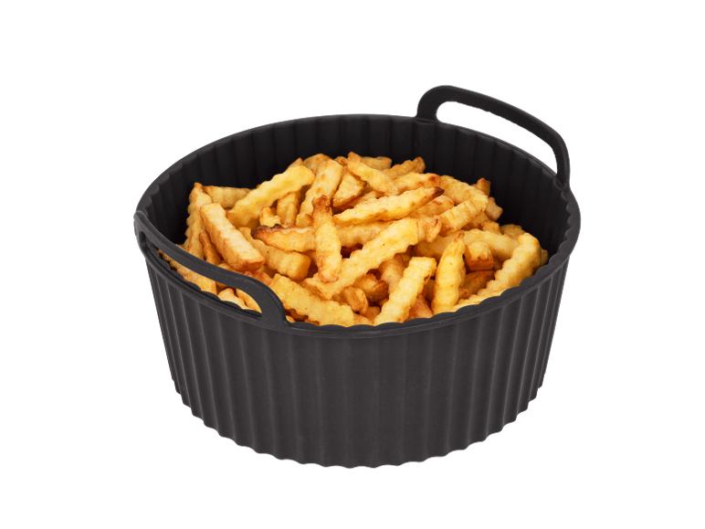 Crispy french fries in a black bowl, ready to enjoy.