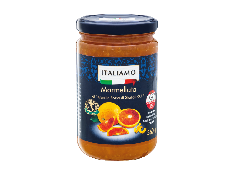 Jar of Sicilian blood orange marmalade with a label and oranges.