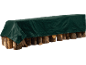 Green firewood tarp covering stacked logs.