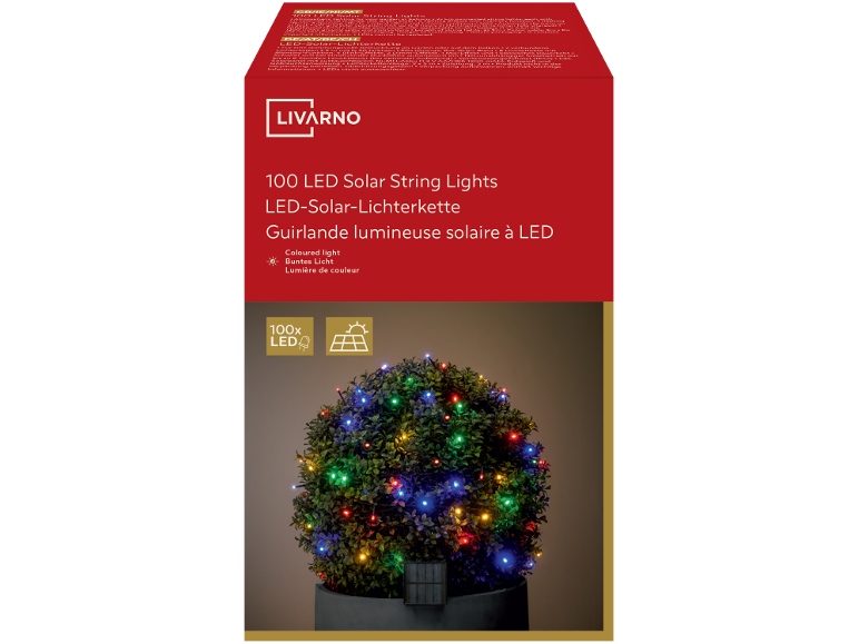 100 LED solar string lights in color, illuminating a bush.