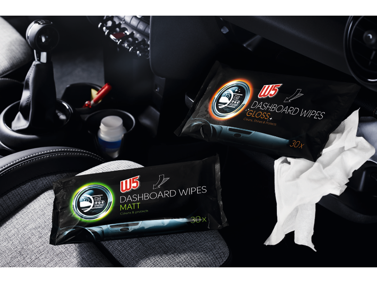 Dashboard wipes, matt and gloss, inside a car.