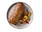 Pork loin with grilled zucchini and white beans on a plate