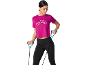 Woman in fuchsia t-shirt and black leggings exercising with a resistance band.