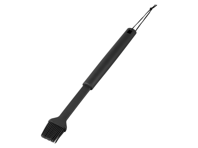 Black silicone basting brush for baking or barbecue with a hanging loop.