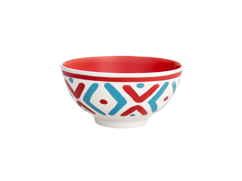 White ceramic bowl with red and blue geometric patterns