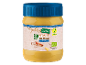 Jar of organic creamy peanut butter, labeled as vegan.