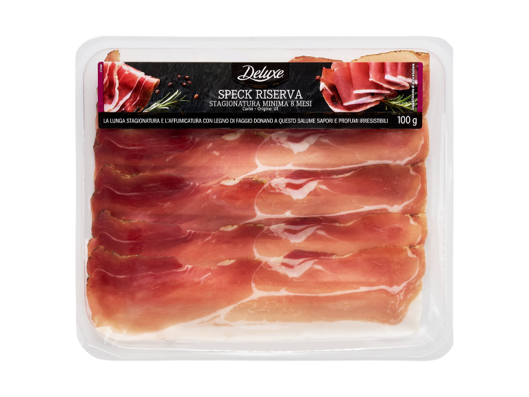 Tray of smoked ham with a 'Speck Riserva' label and 100 g.
