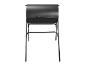 Black smoker grill on a stand with a handle.