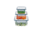 Stackable food containers with peas, bell peppers, and fresh salad.