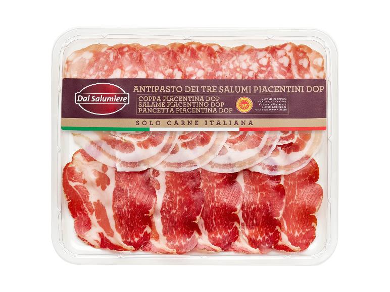 Tray with three types of Italian cured meats: salami, pancetta, and coppa.