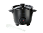 Black rice cooker with a glass lid and a white rice paddle.