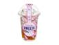 Unicorn sweets mix: clear cup with white, pink, and green marshmallows and fruit jelly.