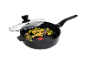 Frying pan with glass lid, featuring Brussels sprouts, onion, and bacon