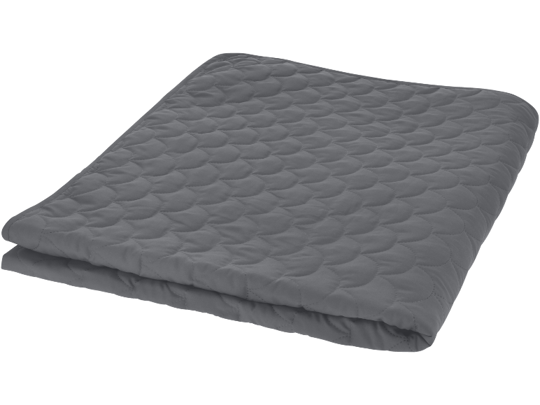Grey quilted blanket with a fish scale pattern