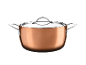 Copper pot with a glass lid and metal handles