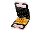Pink waffle maker with an open lid and a baked waffle