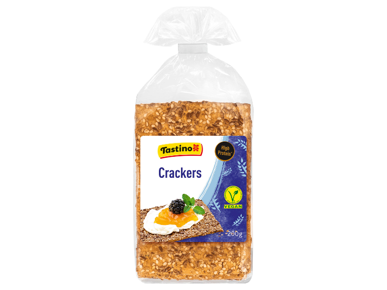 A package of seed crackers, with a label showing a cracker with jam and a berry.