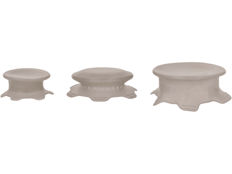 Three beige furniture risers of varying sizes, with wavy edges.