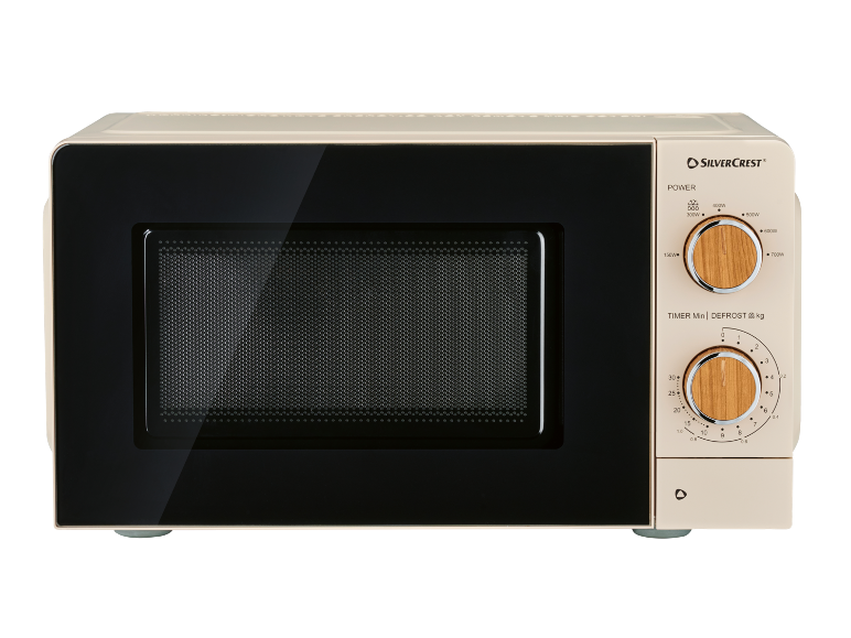 Cream microwave oven with wooden power and timer knobs.