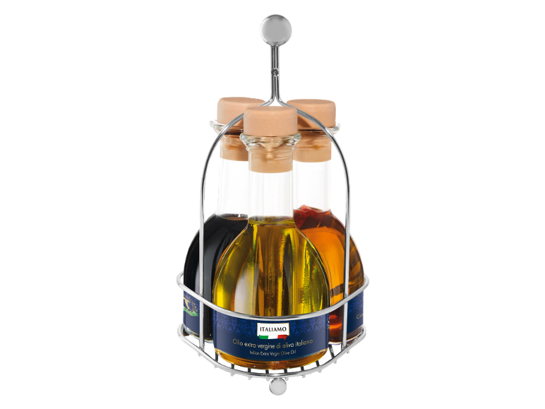 Three bottles of olive oil and vinegar in a metal caddy, with an Italian label.