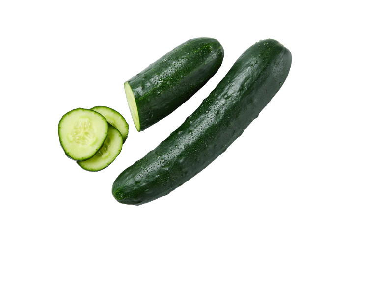Fresh cucumbers, one whole and one sliced, with water droplets on a black background.