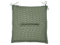 Green chair cushion with ties.