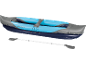 Inflatable kayak with paddle, blue and grey, for water sports.