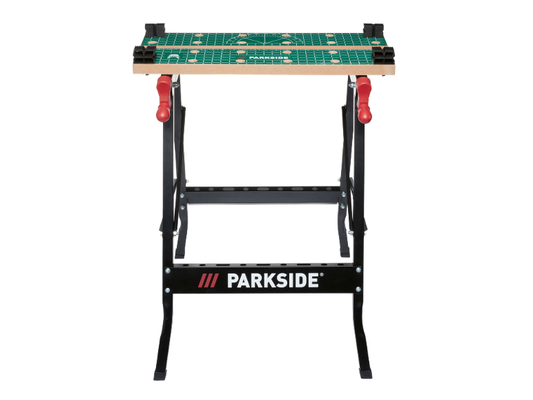 Black folding workbench with a wooden top and a green measuring surface.