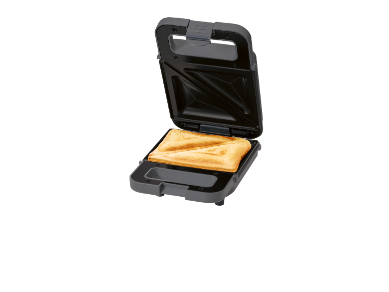 Sandwich maker with a crispy, golden-brown sandwich.