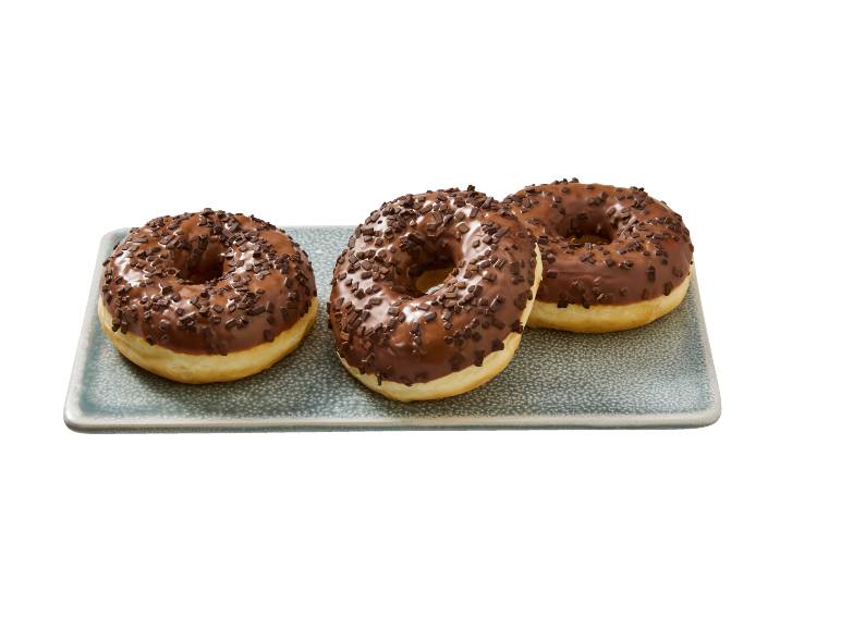 Three chocolate-glazed donuts with sprinkles on a rectangular grey plate.
