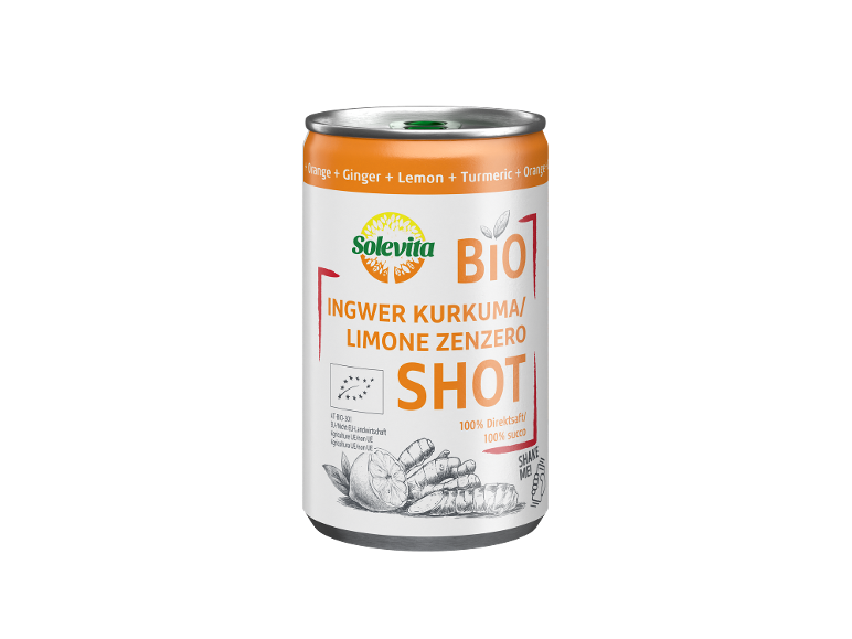 Ginger, turmeric, and lemon drink can with text 'SHOT' and 'SHAKE ME!'.
