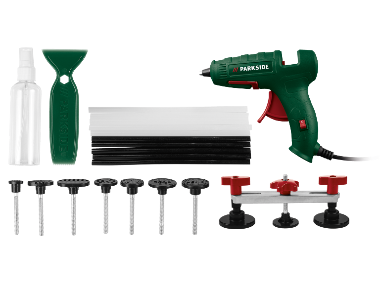 Dent repair kit with hot glue gun, suction cups, and accessories.
