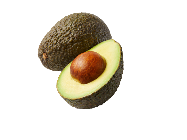 Whole avocado and half avocado with pit on a black background.