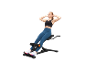 Woman exercising on an abdominal trainer