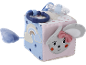 Fabric activity cube with mouse face, rainbow, and teething ring.