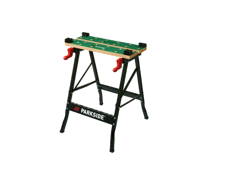 Work bench with a green patterned surface and red handles.