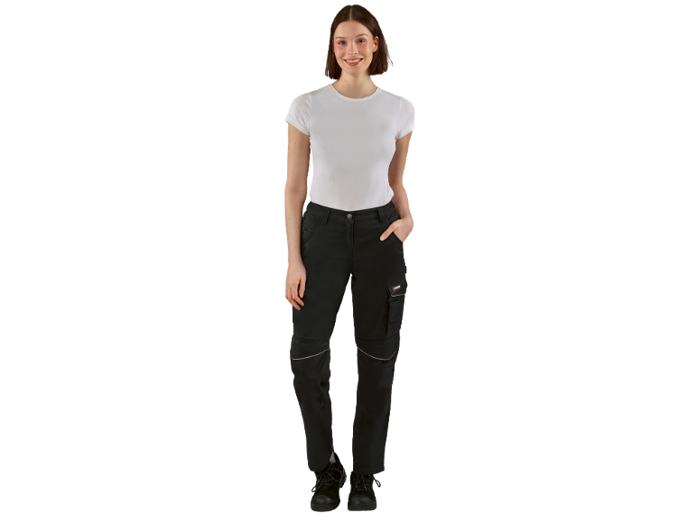 Woman in white t-shirt and black work trousers with black work shoes.