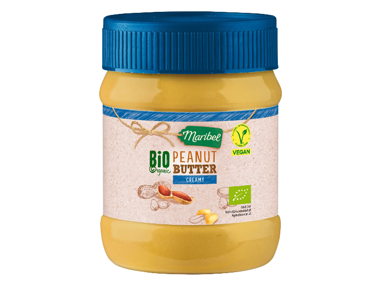 Jar of organic creamy peanut butter, labeled as vegan.