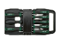 A set of screwdrivers with black and green handles in a dark gray case.