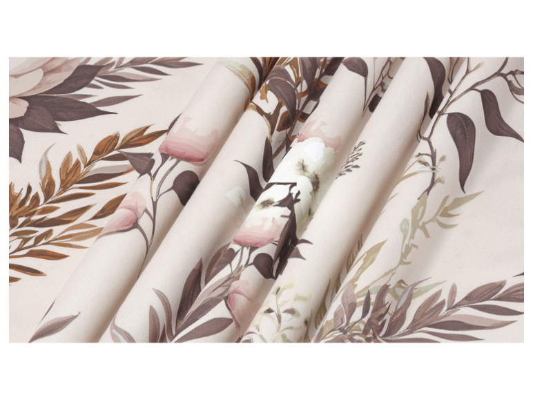 Fabric with a pastel floral pattern, featuring roses and leaves.