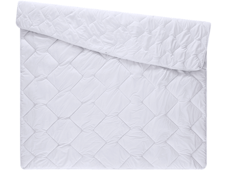 White quilted duvet with diamond pattern, partially folded.