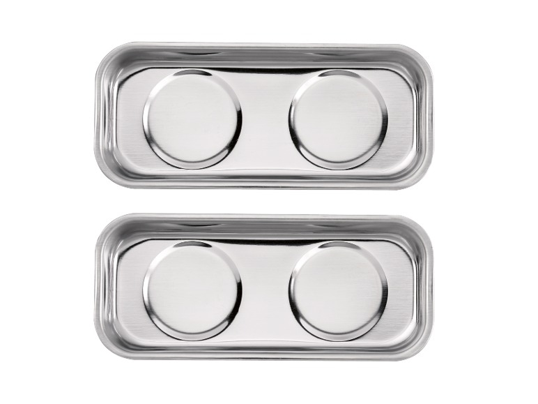 Two rectangular metal trays with two round indentations on a black background.