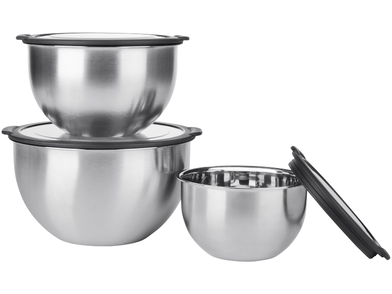 Set of three stainless steel mixing bowls with lids.